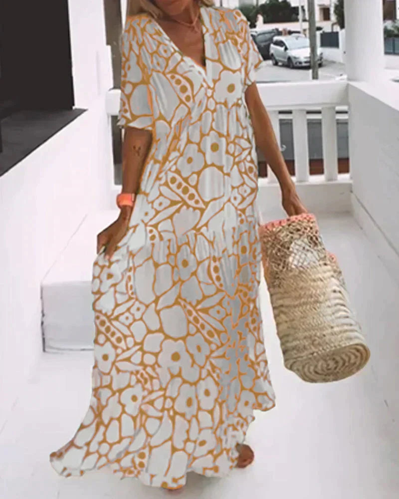 Nuria - Vestido largo de verano de corte vaporoso y elegante estampado gráfico