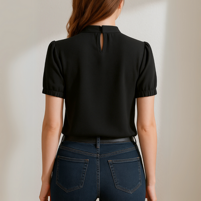 Chelsea - Blusa negra plisada con mangas abiertas