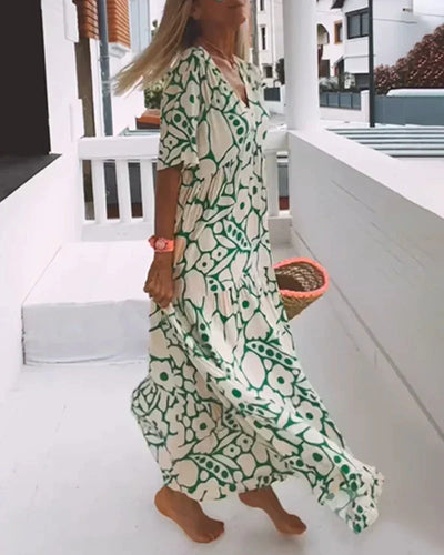 Nuria - Vestido largo de verano de corte vaporoso y elegante estampado gráfico